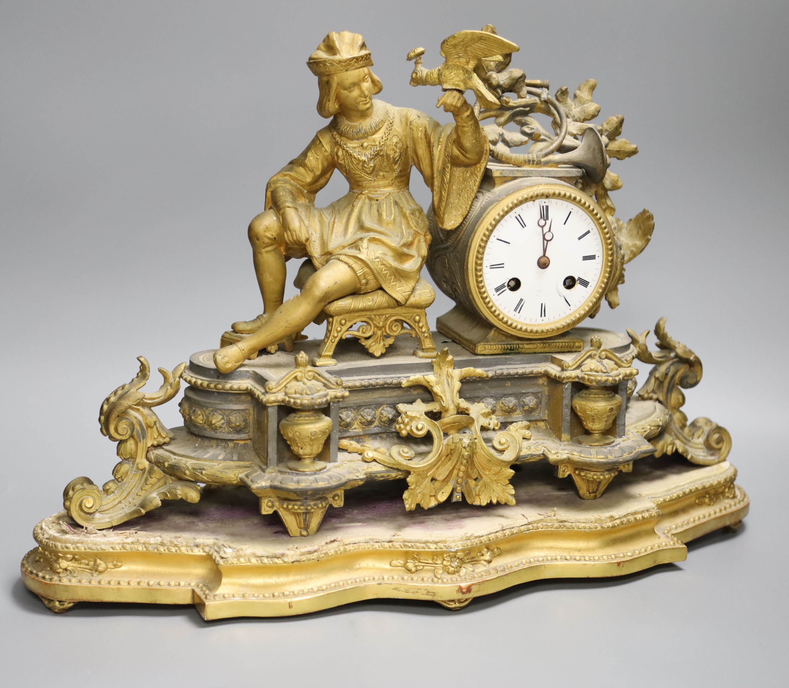 A French gilt metal figural mantel clock and base, overall height 34cm